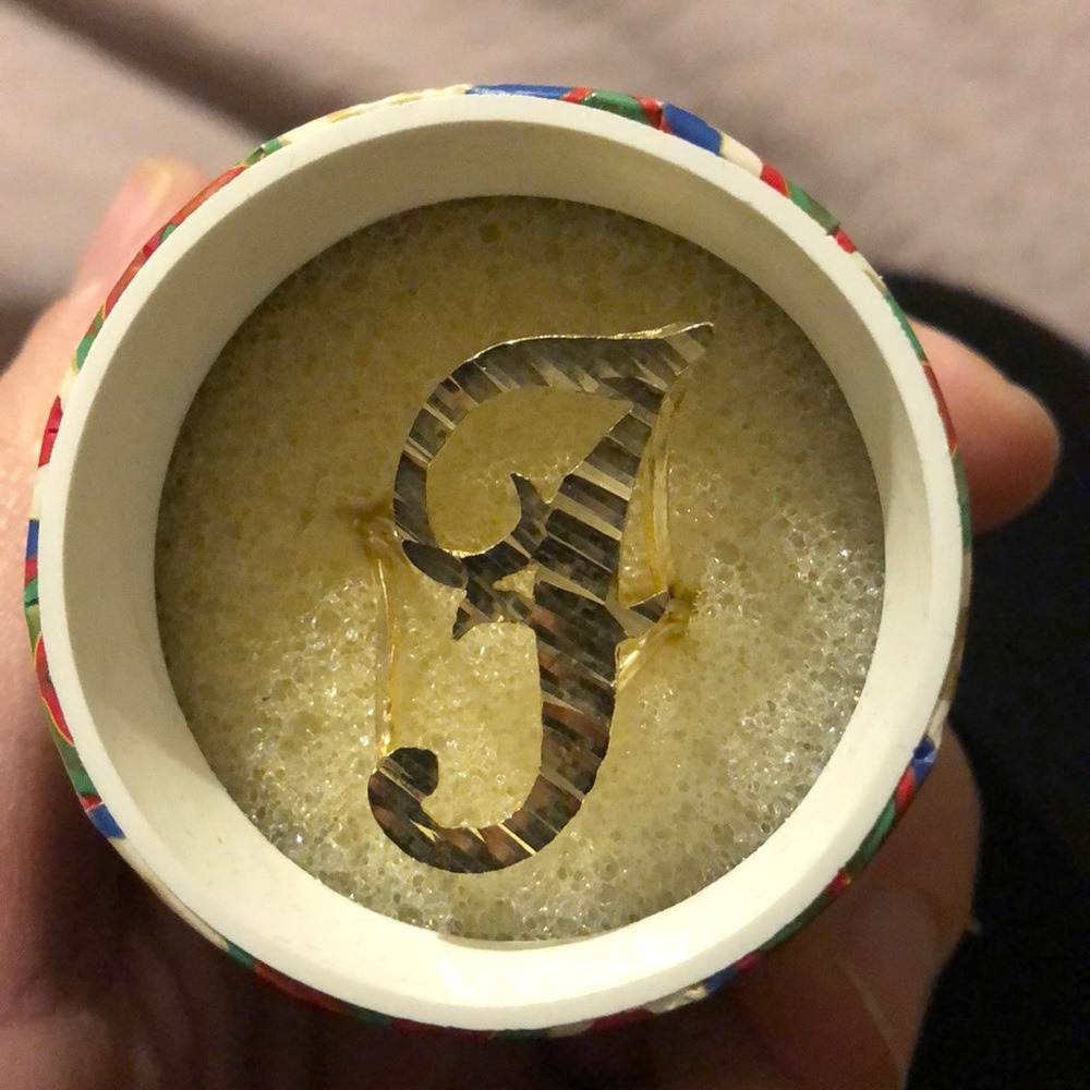Gold ring letter J
